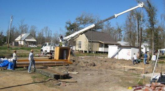 Green Valley Baptist Church sets the pilings for the new bunk house