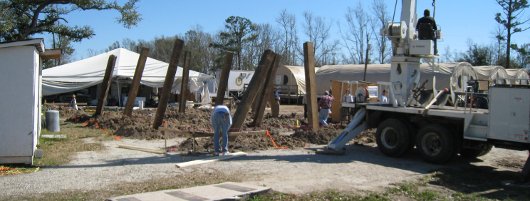 Green Valley Baptist Church sets the pilings for the new bunk house