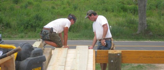 Locals erect Mercy House walls